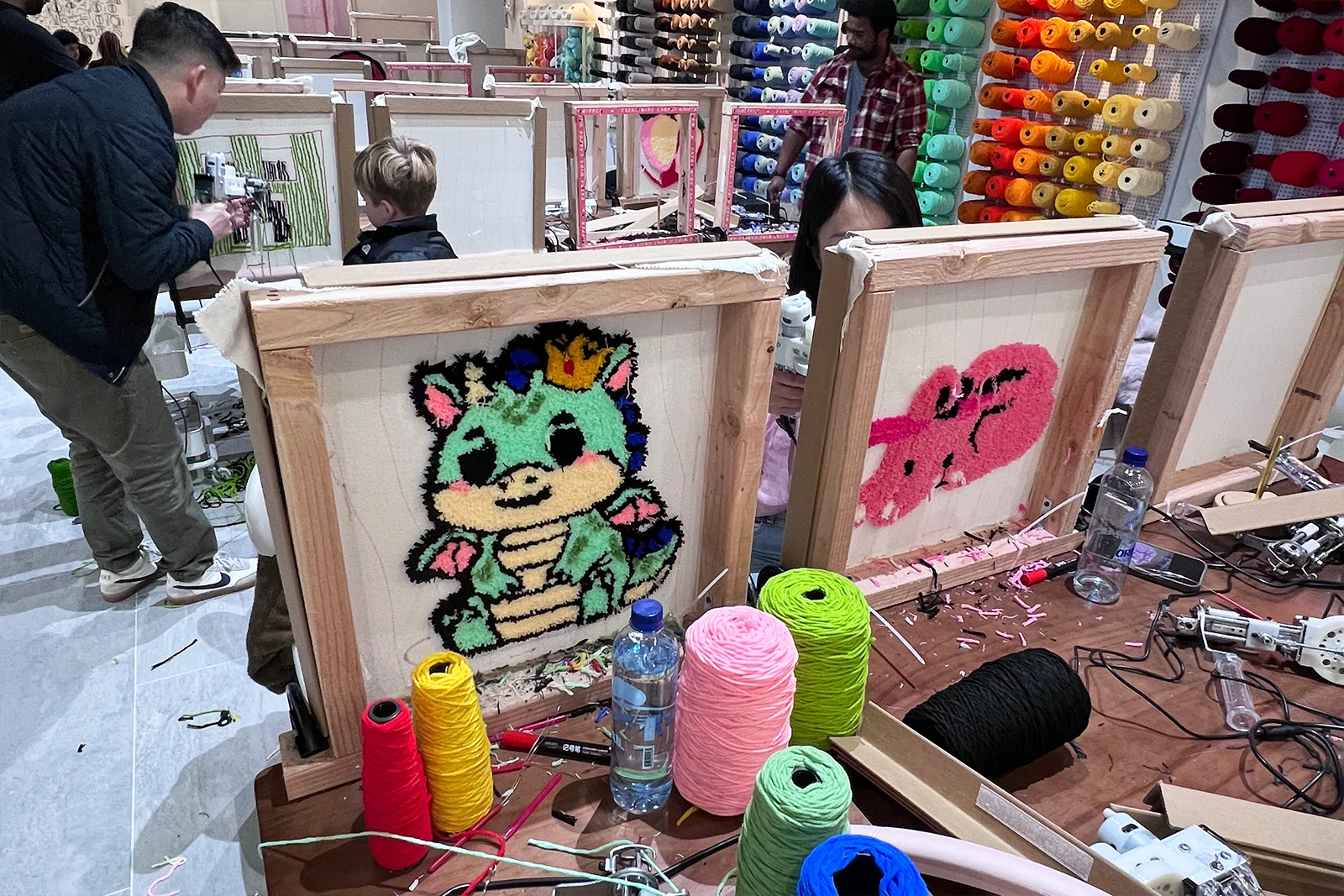 Colorful tufted rug creations at Tutu Together studio in Tukwila