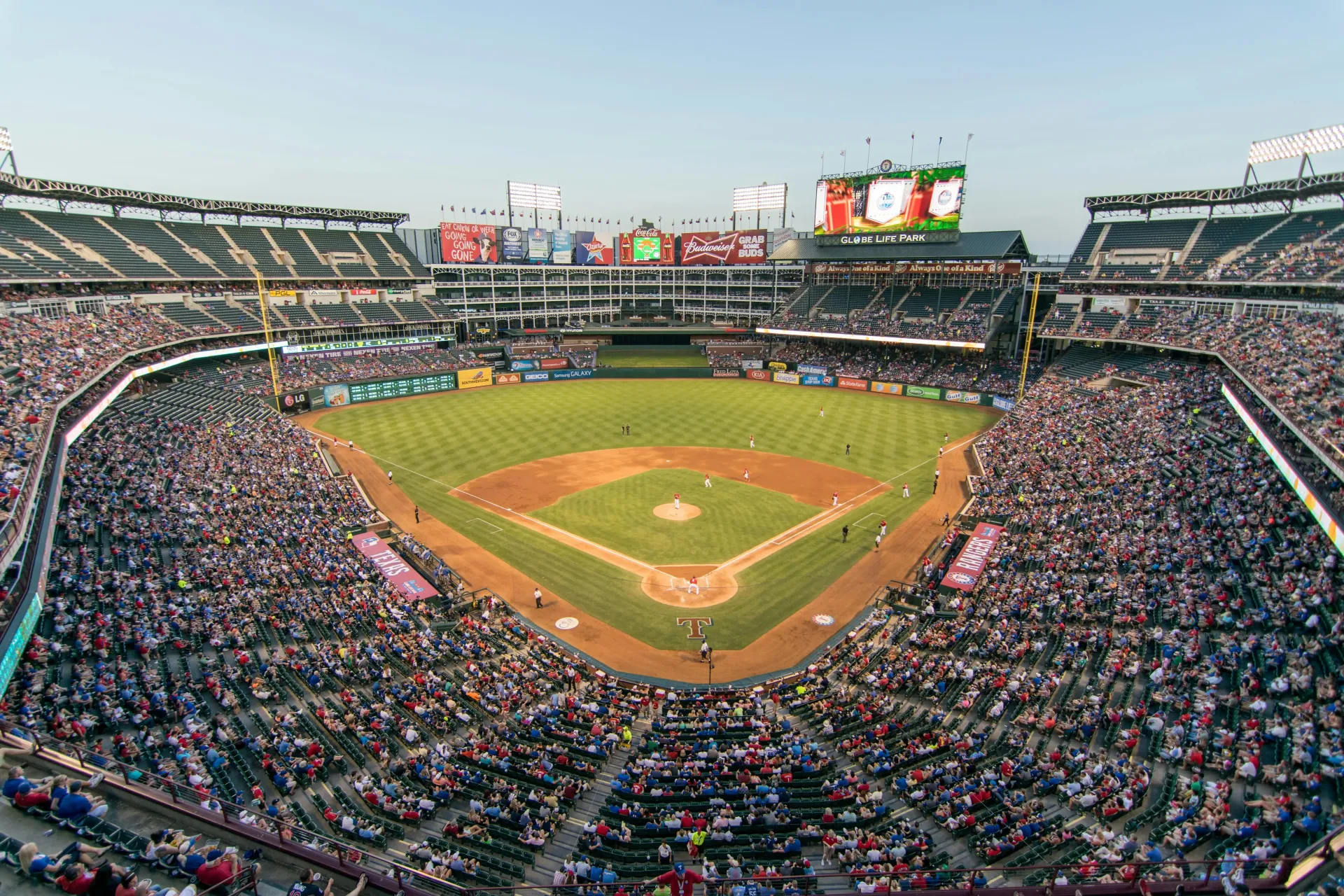 Romantic couple enjoying sports & entertainment in Arlington - perfect date planning destination with stunning city views and intimate atmosphere