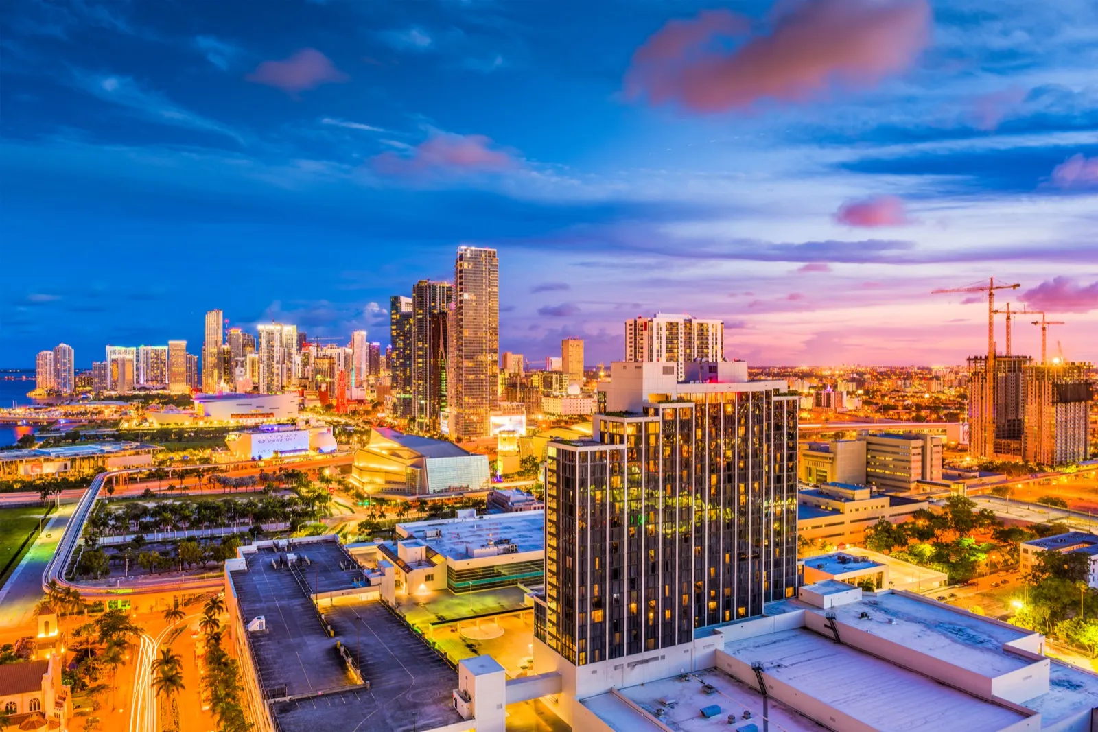 Romantic couple enjoying beach paradise in Miami - perfect date planning destination with stunning city views and intimate atmosphere