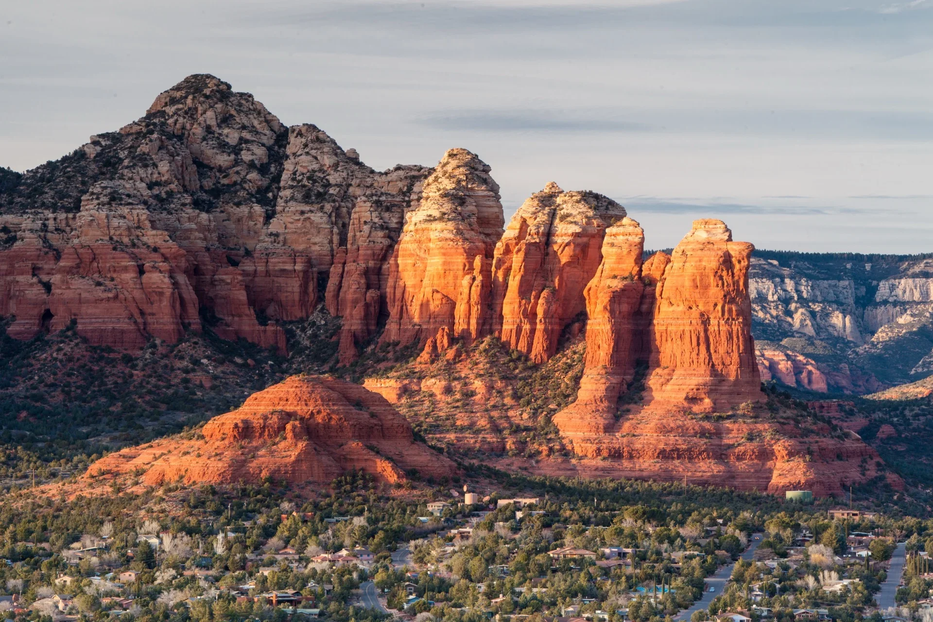Couple watching sunset from Airport Mesa vortex overlook in Sedona