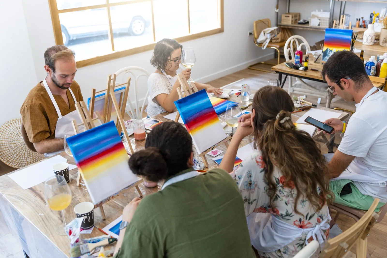 Couple creating art with dollar store supplies