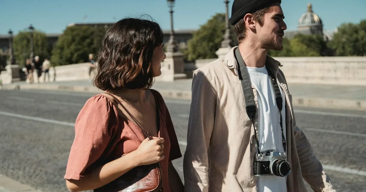 Couple creating a memory scrapbook together for date night
