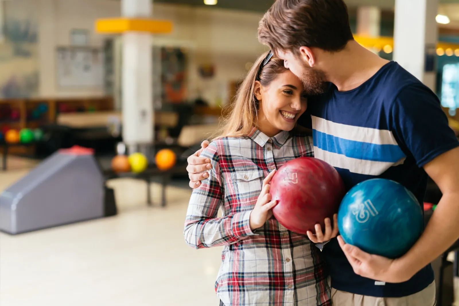 Couple bowling on a fun date night