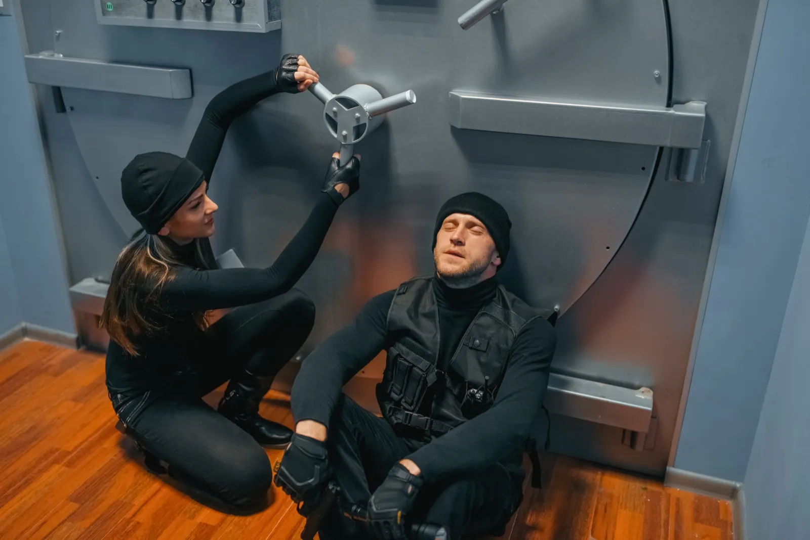 Couple solving puzzles together at an escape room in Charlotte