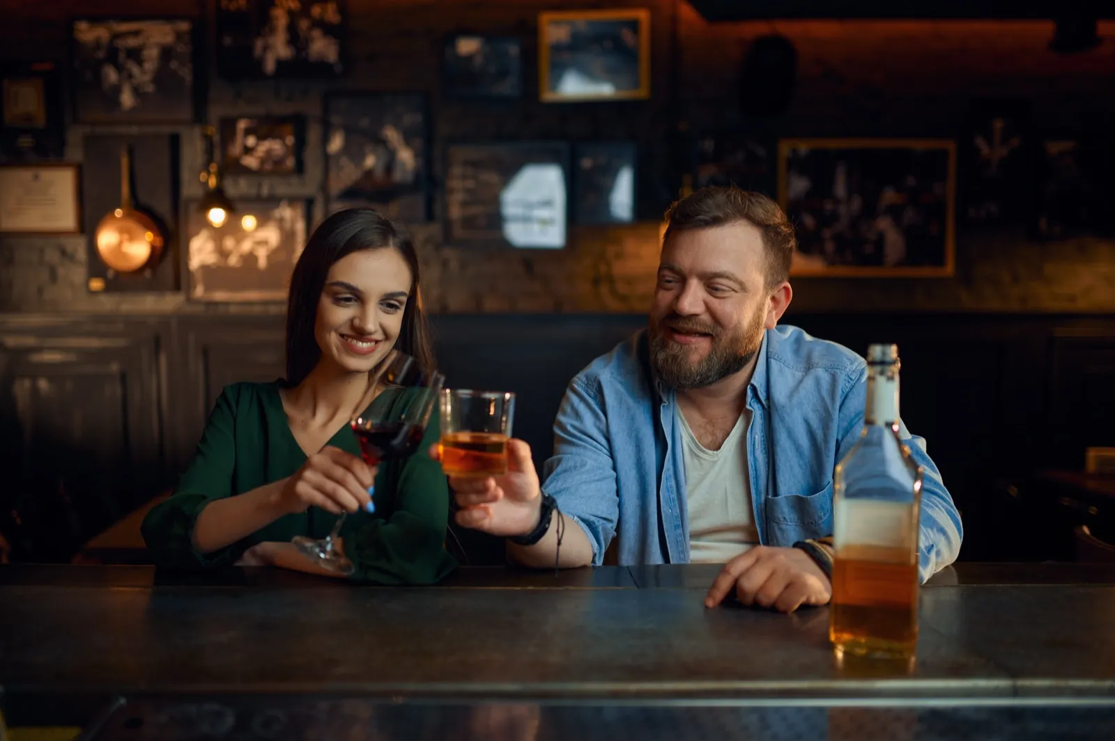 Couple enjoying drinks at a neighborhood bar on Lower Greenville Dallas