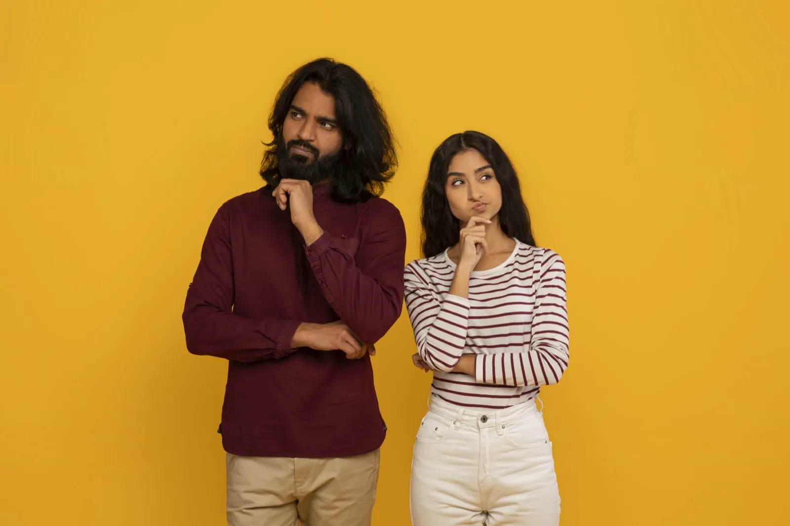 Couple in thoughtful conversation about their relationship compatibility