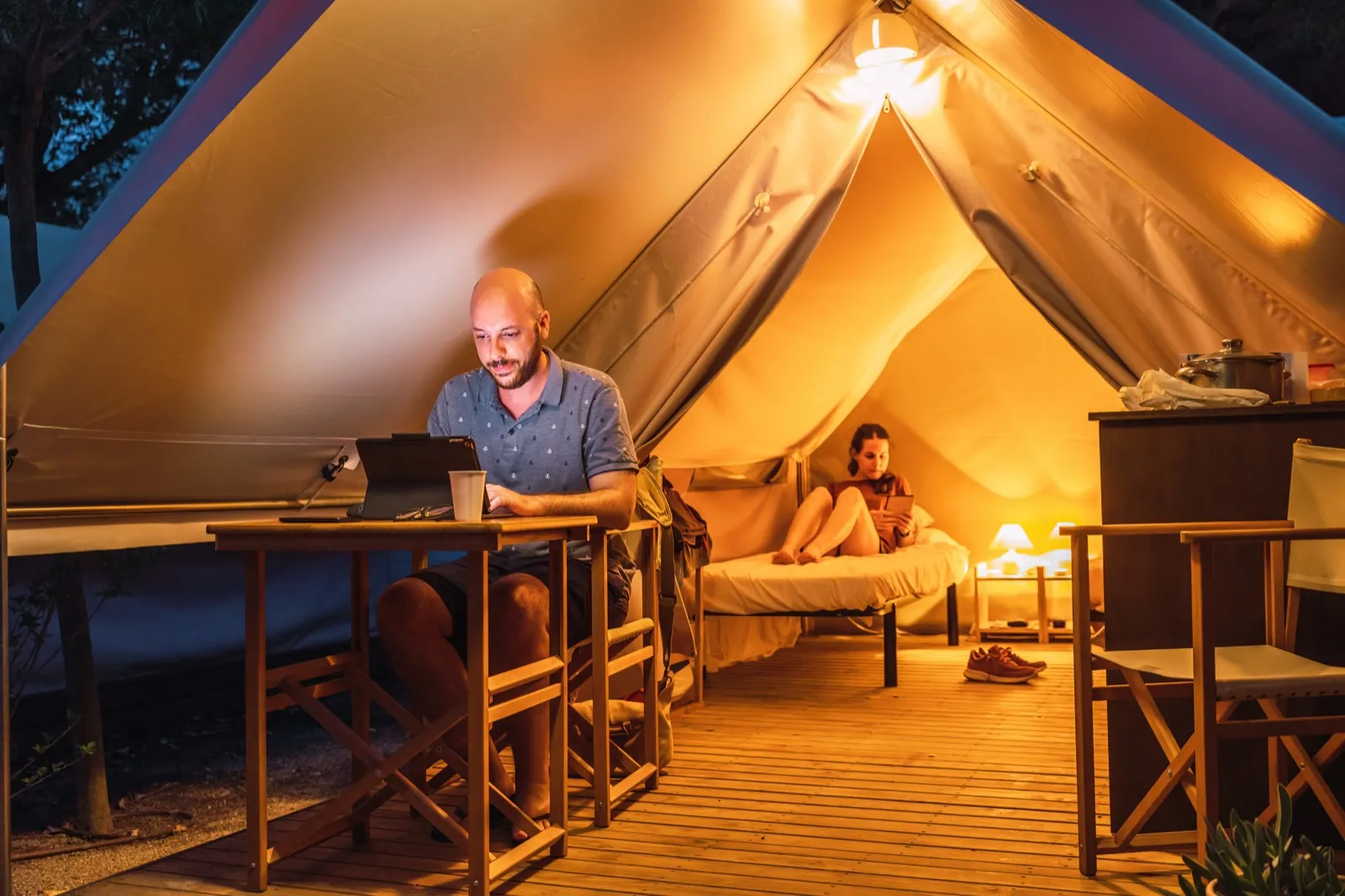 Couple on a romantic glamping getaway date