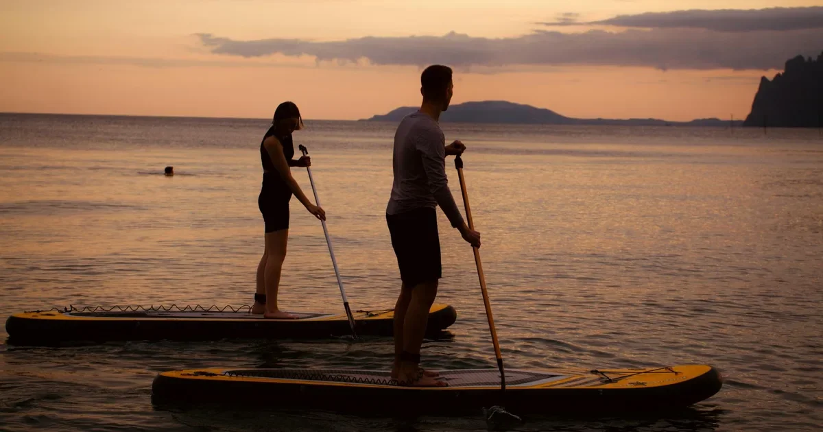 Stand-up paddleboard yoga Shilshole Bay Seattle Ballard couples adventure date