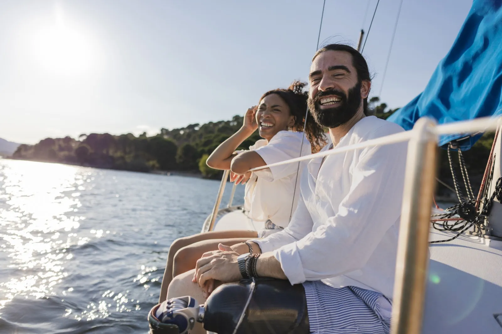 Couple on a romantic sunset boat ride date