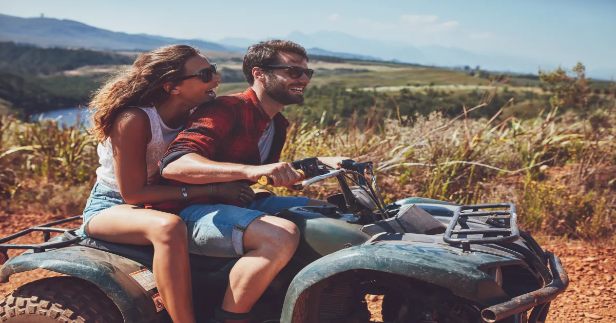 Couple on a Pink Jeep Tour driving through Broken Arrow trail