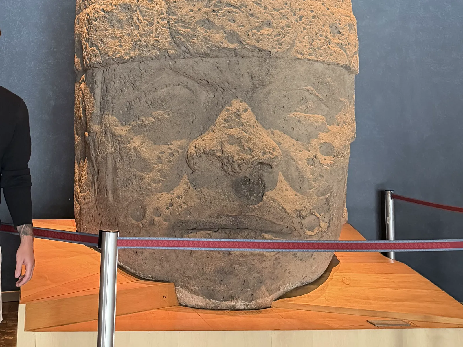 A colossal carved Olmec stone head on display at the Museo Nacional de Antropologia