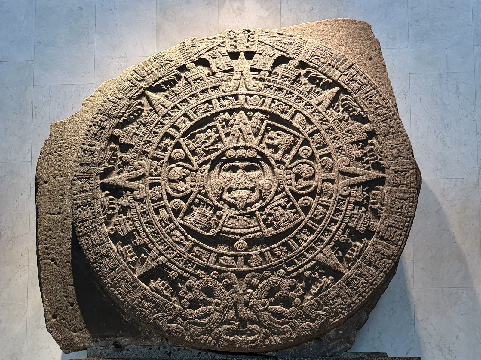The Aztec Sun Stone mounted on a wall at the Museo Nacional de Antropologia in Mexico City