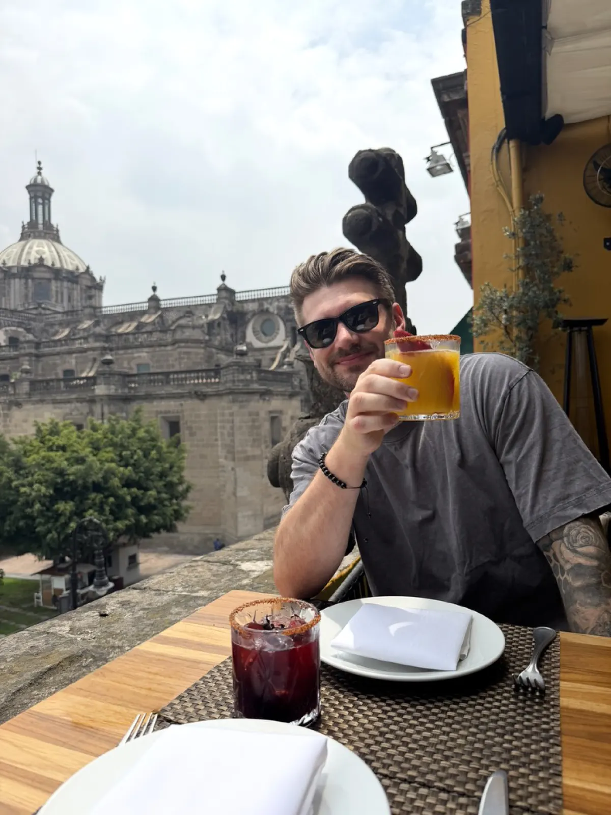 A drink on the rooftop terrace at La Casa de las Sirenas looking out over the Templo Mayor ruins and the Zocalo
