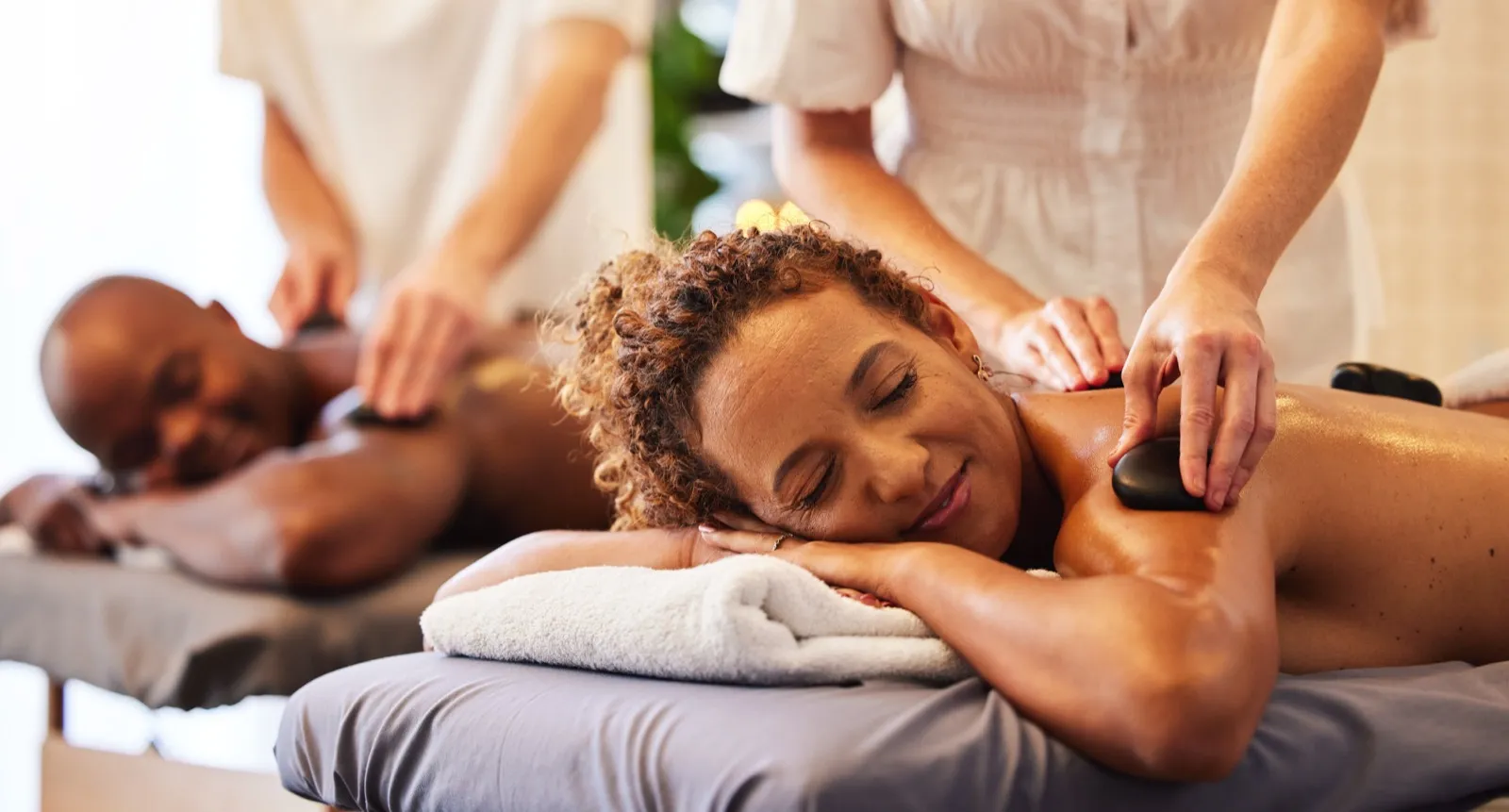 Couple enjoying hot stone massage at Enchantment Resort spa in Sedona
