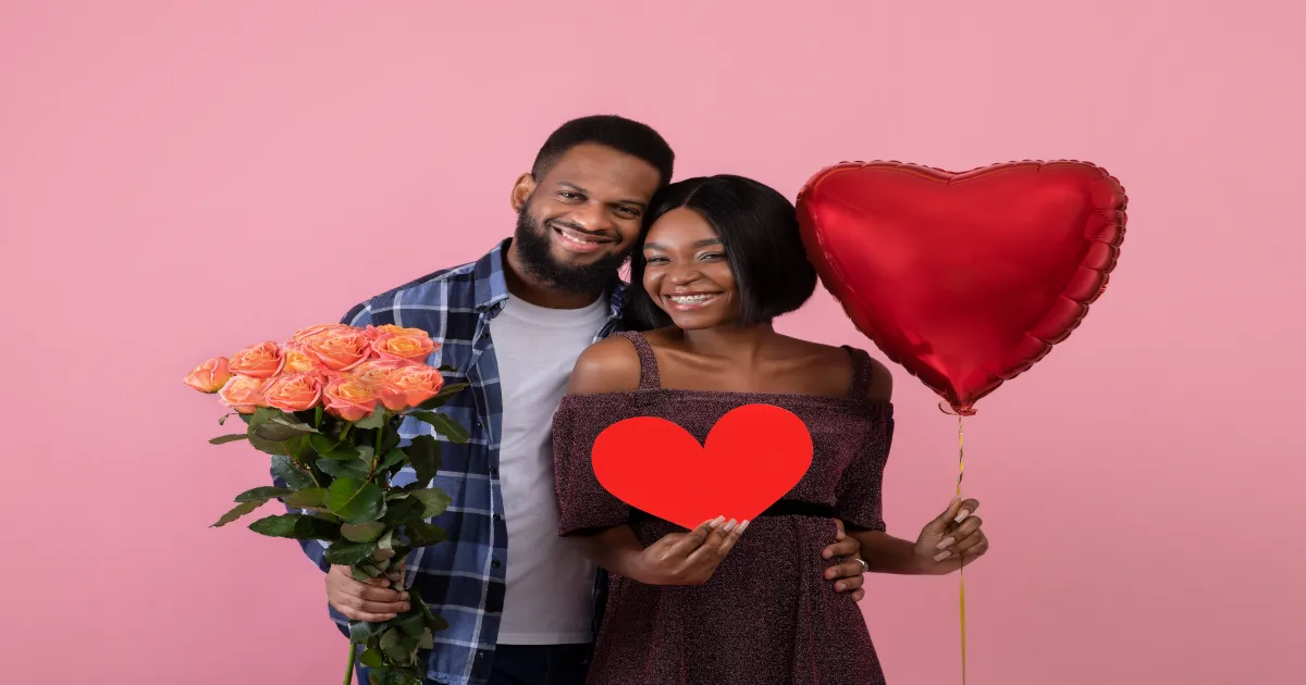 Couple connected with Valentine's Day hearts for long-distance date